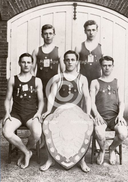 Rowntree boys life-saving team pose with the Faber Life-Saving Trophy, 1912. Artist: Unknown