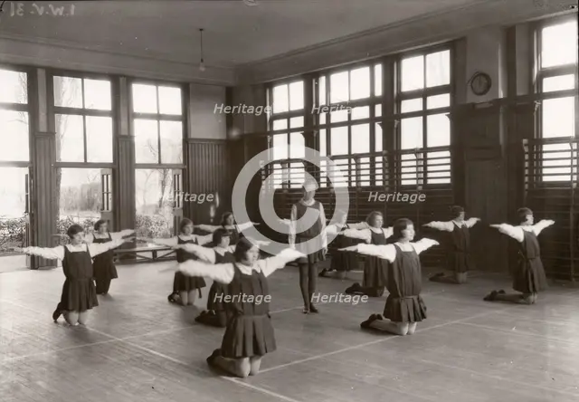 Rowntree girls in an indoor gymnastic class, 1930. Artist: Unknown