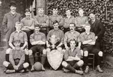 Rowntree Football Club 1st team pose with trophy and cup, York, Yorkshire, 1902