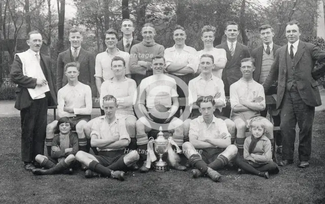 Rowntree football team pose with cup, 1929. Artist: Unknown