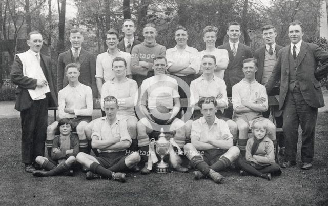 Rowntree football team pose with cup, 1929. Artist: Unknown