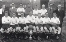 Rowntree football team pose with cup, 1936