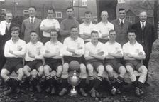 Rowntree football team pose with cup, 1936