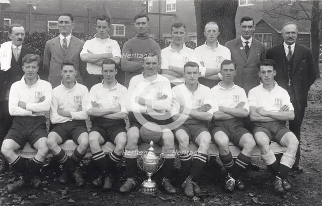 Rowntree football team pose with cup, 1936. Artist: Unknown
