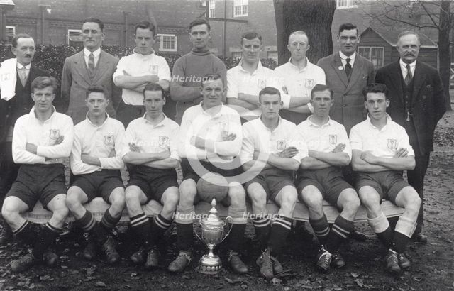 Rowntree football team pose with cup, 1936. Artist: Unknown