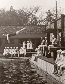 Rowntree factory workers sit around swimming pool, Yearsley baths, York, Yorkshire, 1933