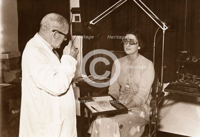 Rowntree optician at work, York, Yorkshire, 1956. Artist: Unknown