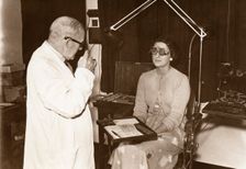 Rowntree optician at work, York, Yorkshire, 1956