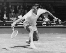 Roy Emerson, Australian tennis player, in action at Wimbledon, 1964. Creator: Unknown