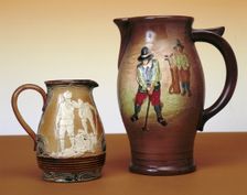 Royal Doulton pitchers with golfing theme, c1910. Creator: Unknown