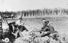 Royal Engineers Special Brigade officers and Thomas Davies servant assembling M bombs..., 1919. Creator: Unknown