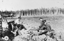 Royal Engineers Special Brigade officers and Thomas Davies servant assembling M bombs..., 1919. Creator: Unknown
