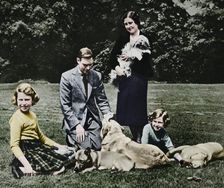 Royal family as a happy group of dog lovers, 1937. Creator: Michael Chance
