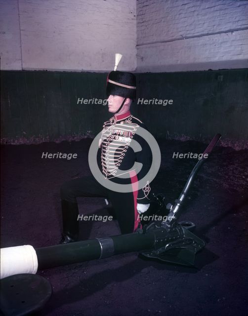 Royal Horse Artillery gun team in full dress, sergeant kneeling, c1953.  Creator: Arthur Charles Kirby Ware.