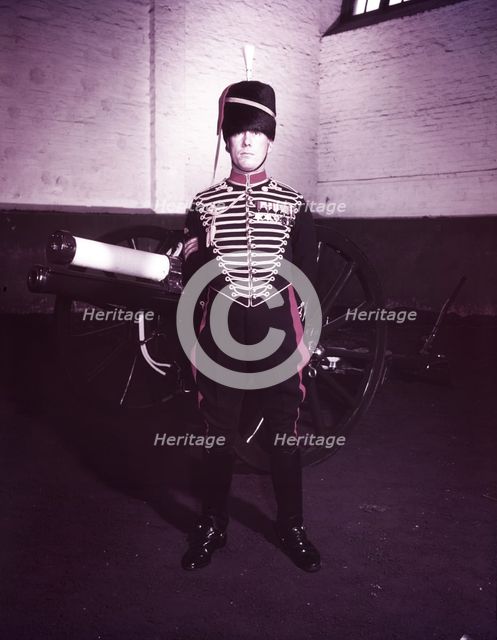 Royal Horse Artillery gun team in full dress, sergeant standing, c1953.  Creator: Arthur Charles Kirby Ware.