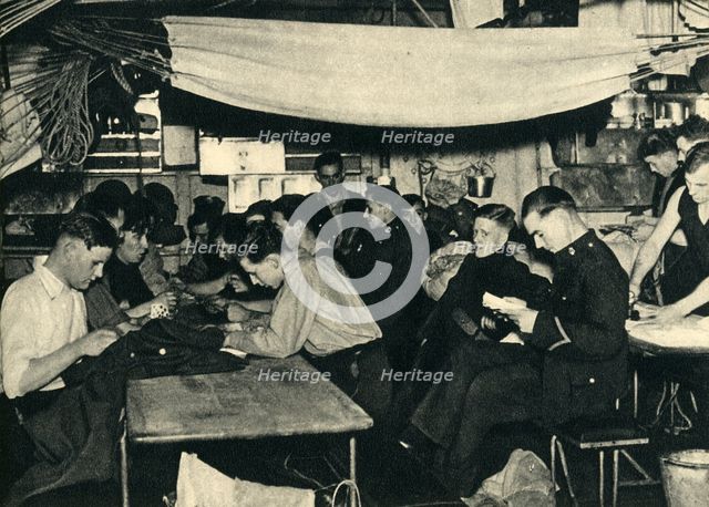 Royal Marines on their mess deck on board a ship, World War II, c1939-c1943 (1944). Creator: Unknown.