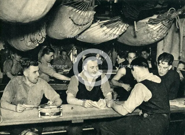 Royal Marines on their mess deck on board a ship, World War II, c1939-c1943 (1944). Creator: Unknown.