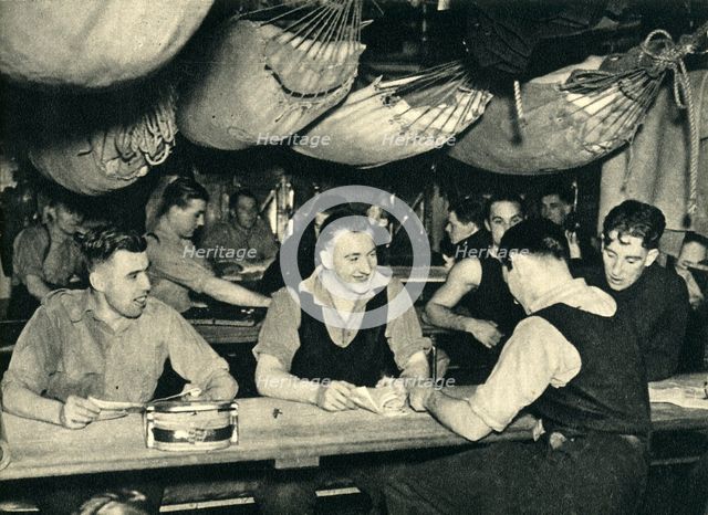 Royal Marines on their mess deck on board a ship, World War II, c1939-c1943 (1944). Creator: Unknown.