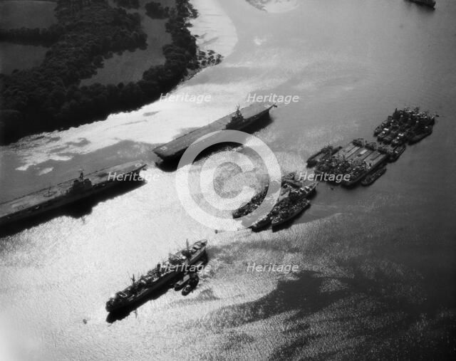 Royal Navy aircraft carriers and other military ships on the River Tamar, Plymouth, Devon, 1959. Artist: Harold Wingham.