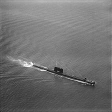 Royal Navy submarine HMS Grampus off Portsmouth, Hampshire, 1962. Artist: Franks