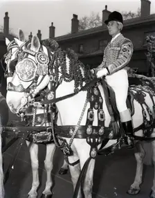 Royal postilion on a grey horse at the Royal Mews in London, c1953. Creator: Arthur Charles Kirby Ware
