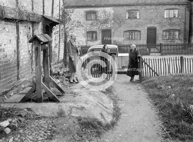 Road testing a Triumph Scorpion, Horley, Surrey, 1931. Artist: Bill Brunell.