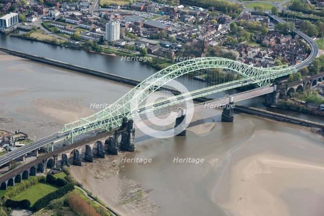 Road and rail bridges over the River Mersey and Manchester Ship Canal at Runcorn Gap, Halton, 2021. Creator: Damian Grady.