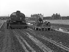 Road construction work, Doncaster, South Yorkshire, November 1955. Creator: Michael Walters