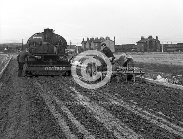 Road construction work, Doncaster, South Yorkshire, November 1955. Creator: Michael Walters.