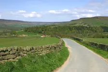 Road in Farndale, North York Moors, North Yorkshire. Creator: Peter Thompson