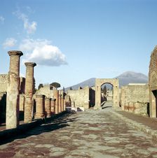 Road leading to Arch of Caligula with Vesuvius beyond, Pompeii, Italy. Creator: Unknown