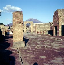Road leading to Arch of Caligula with Vesuvius beyond, Pompeii, Italy. Creator: Unknown