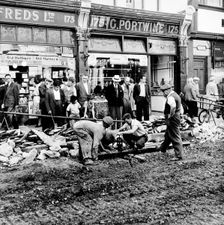Road repairs in Portobello Road, London, c1956. Creator: Henry Grant