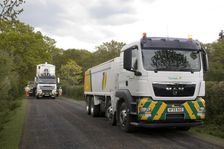 Road resurfacing work repairing potholes