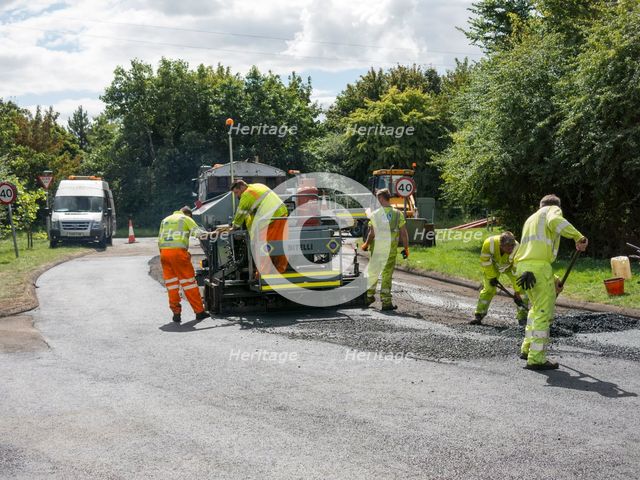 Road resurfacing in Hampshire, UK 2014. Creator: Unknown.
