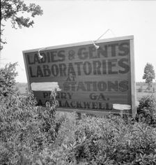 Road sign near Perry, Georgia, 1936. Creator: Dorothea Lange