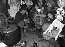 Roadside gipsy family inside a bender (wigwam construction), Newdigate, Surrey, 1960s(?)
