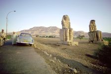 Roadside view of the Colossi of Memnon, Luxor Thebes), Egypt. Creator: Tony Evans