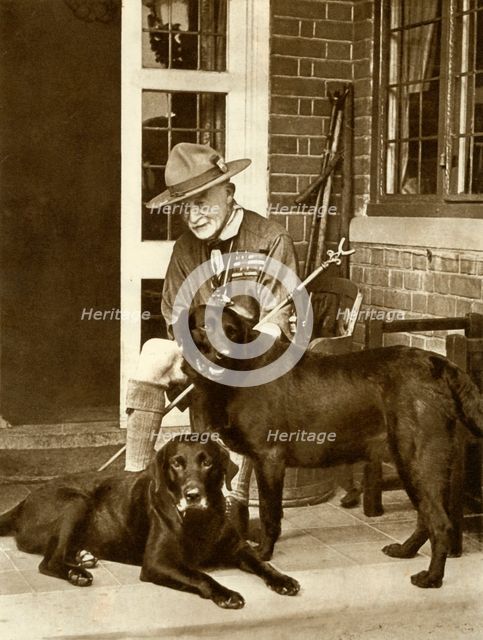 Robert Baden-Powell at home with his dogs, c1929, (1935). Creator: Unknown.