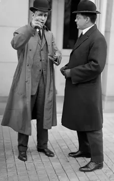 Robert D. Heinl, Newspaper Correspondent - Left, with F.W. Taylor, Secretary To MacVeagh, 1913. Creator: Harris & Ewing