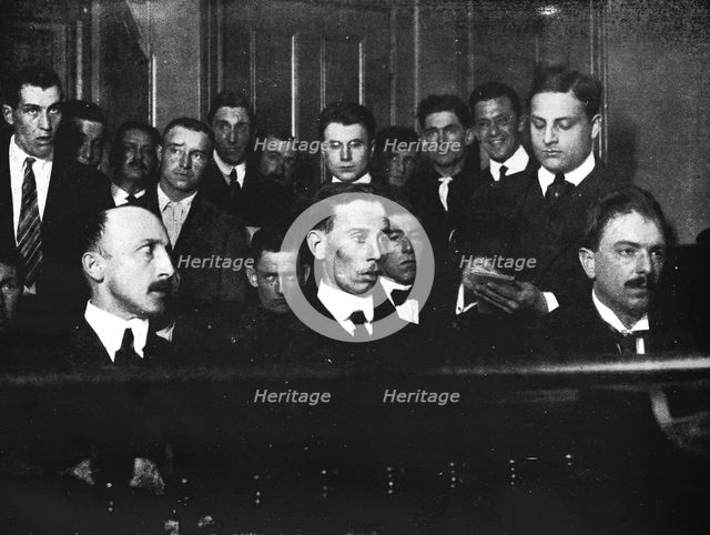 Robert Fay (on the left) and his two accomplices photographed in court ', 1915.  Artist: Unknown.