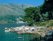 Rocky beach, Cavtat, Croatia. Creator: Peter Thompson