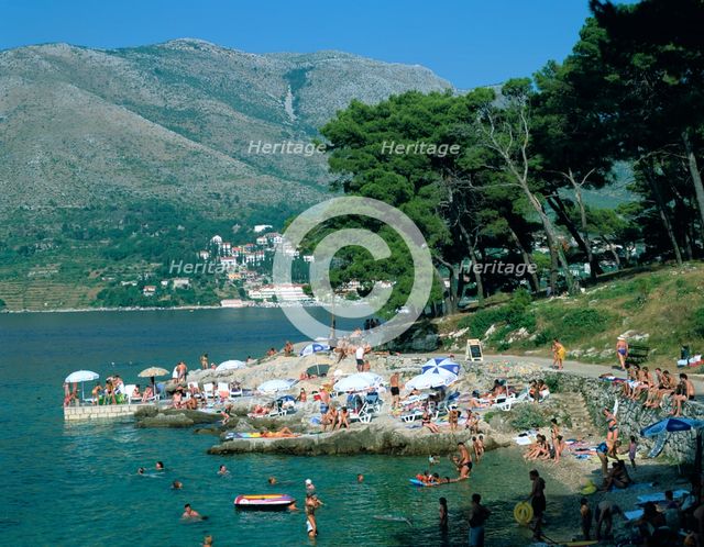 Rocky beach, Cavtat, Croatia. Creator: Peter Thompson.