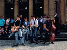 Rock Group outside the National Gallery of Scotland, Edinburgh Festival, Edinburgh, Scotland. Creator: Peter Thompson