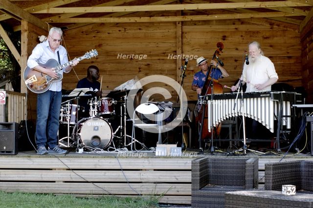 Roger Beaujolais Quartet, Jim Mullen, Winston Clifford, Simon Thorpe, Roger Beaujolais, Kent, 2021. Creator: Brian O'Connor.
