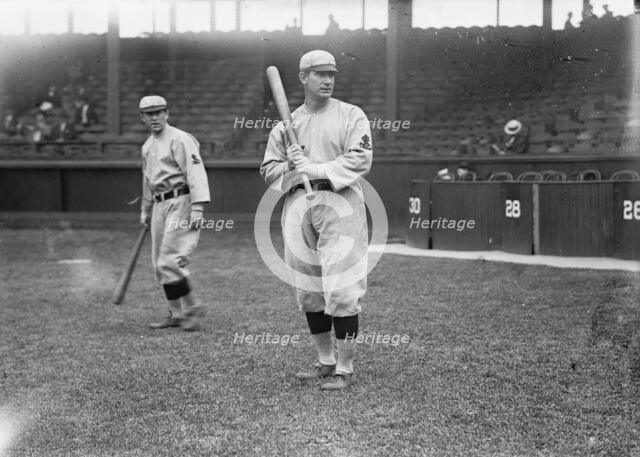 Roger Bresnahan, St. Louis, NL, Miller Huggins in background (baseball), c1911. Creator: Bain News Service.