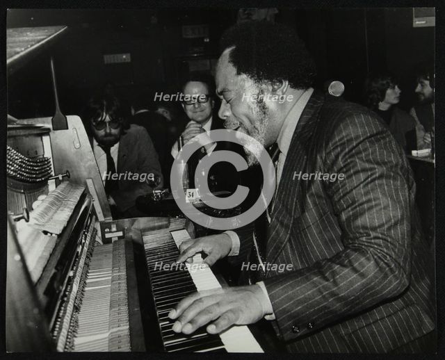 Roland Hanna playing the piano, 1980. Creator: Denis Williams.