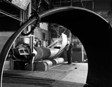 Rolling plate at Edgar Allen's steel foundry, Sheffield, South Yorkshire, 1964. Creator: Michael Walters