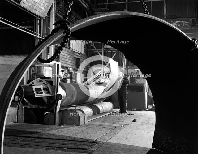 Rolling plate at Edgar Allen's steel foundry, Sheffield, South Yorkshire, 1964. Creator: Michael Walters.