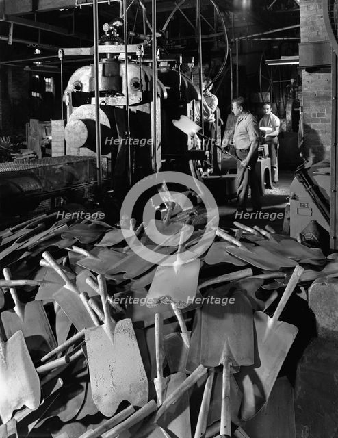 Rolling spade blades, Everlast Tools, Sheffield, South Yorkshire, 1965.  Creator: Michael Walters.